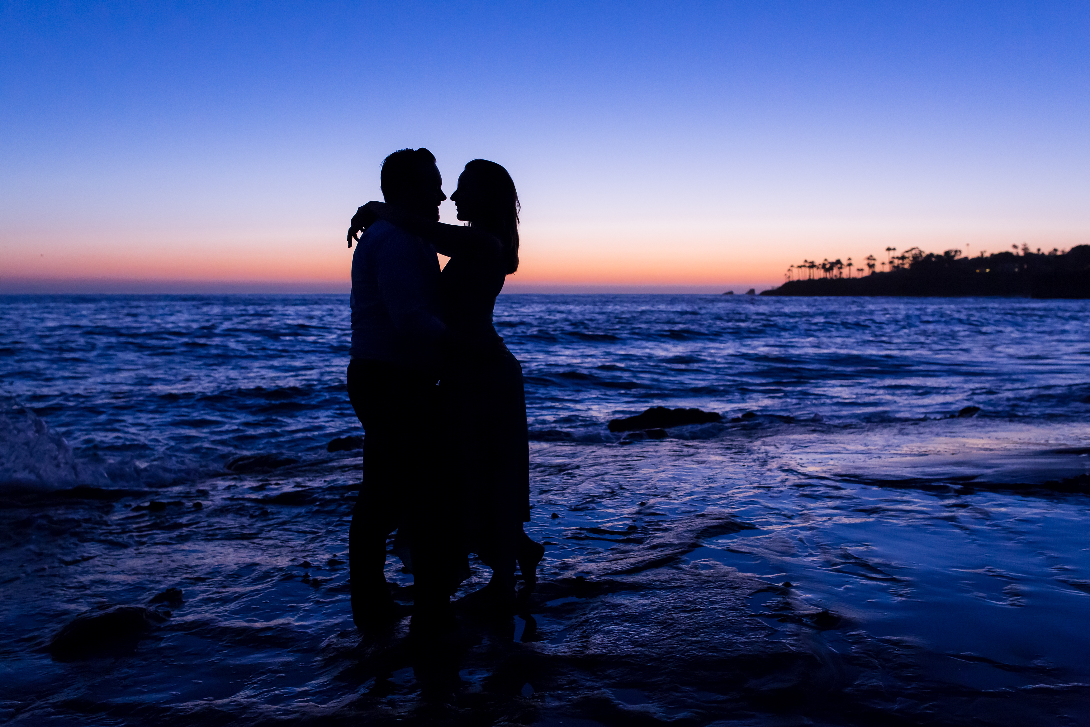 Couple at Laguna Beach sunset