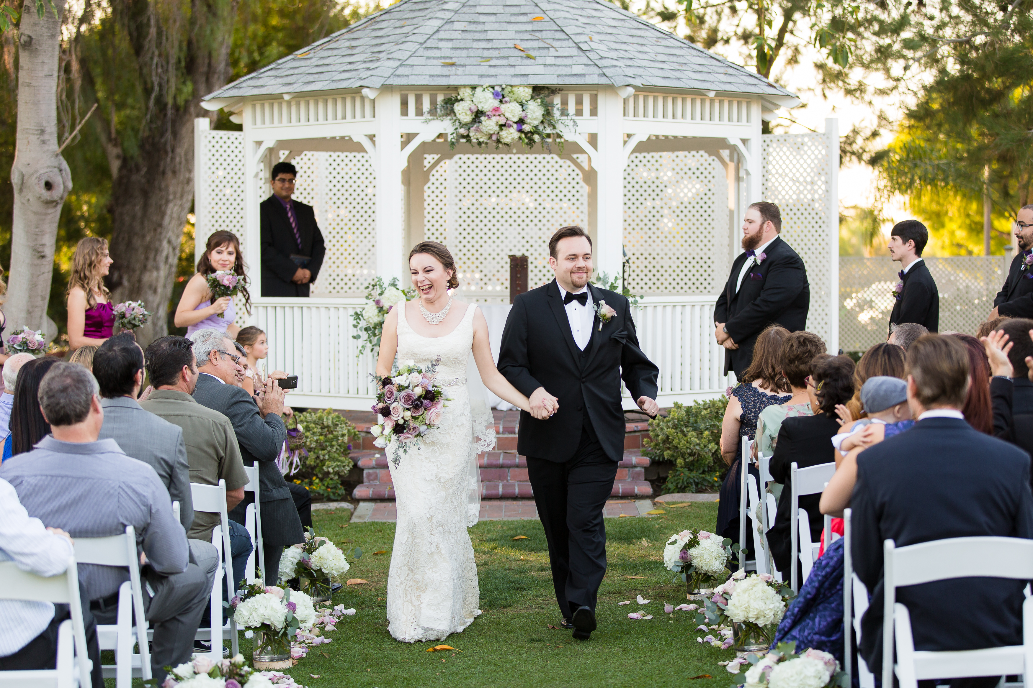 Couple walking down the aisle after Alta Vista Country Club wedding ceremony