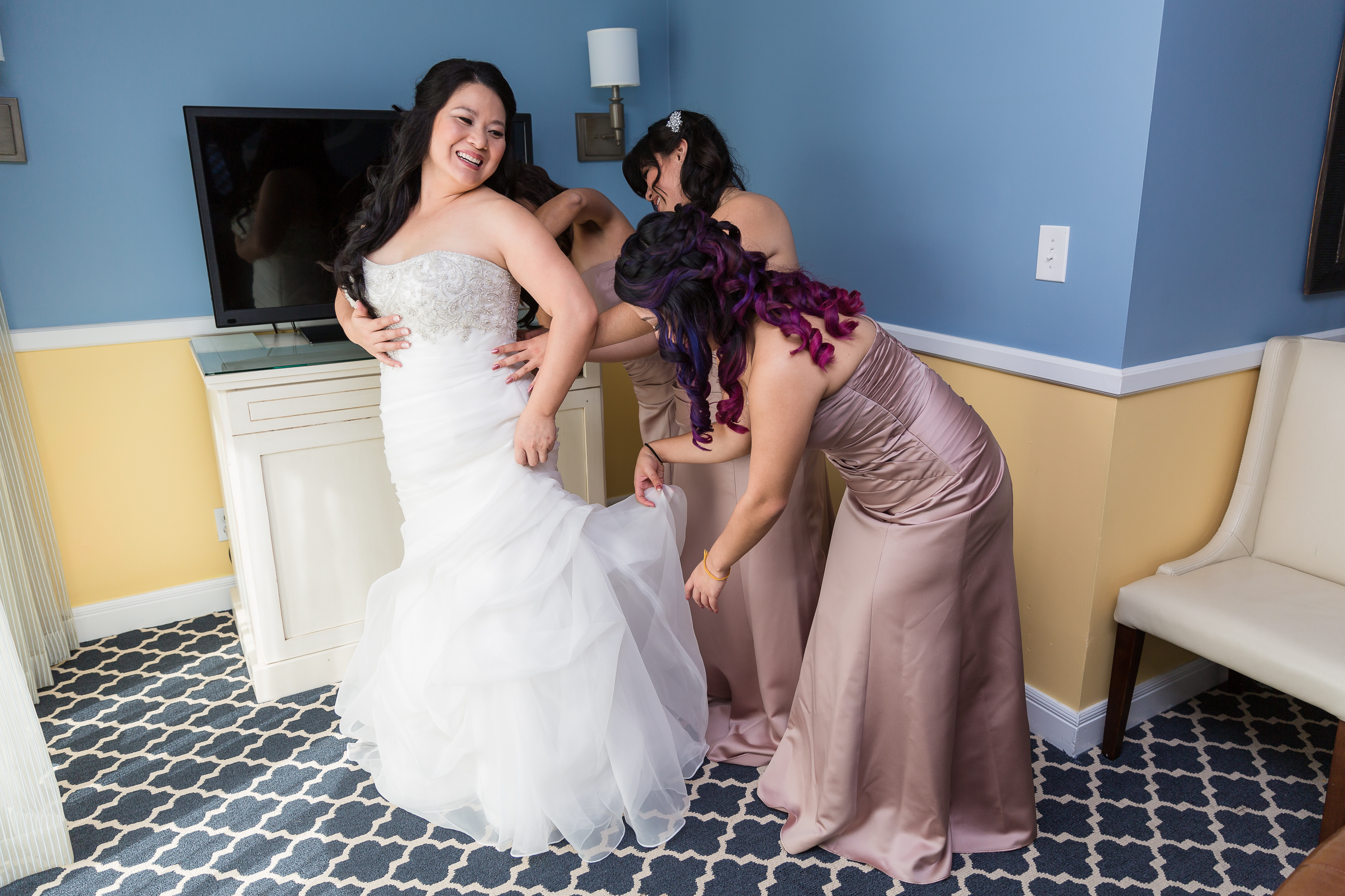 Bride with bridesmaids getting ready