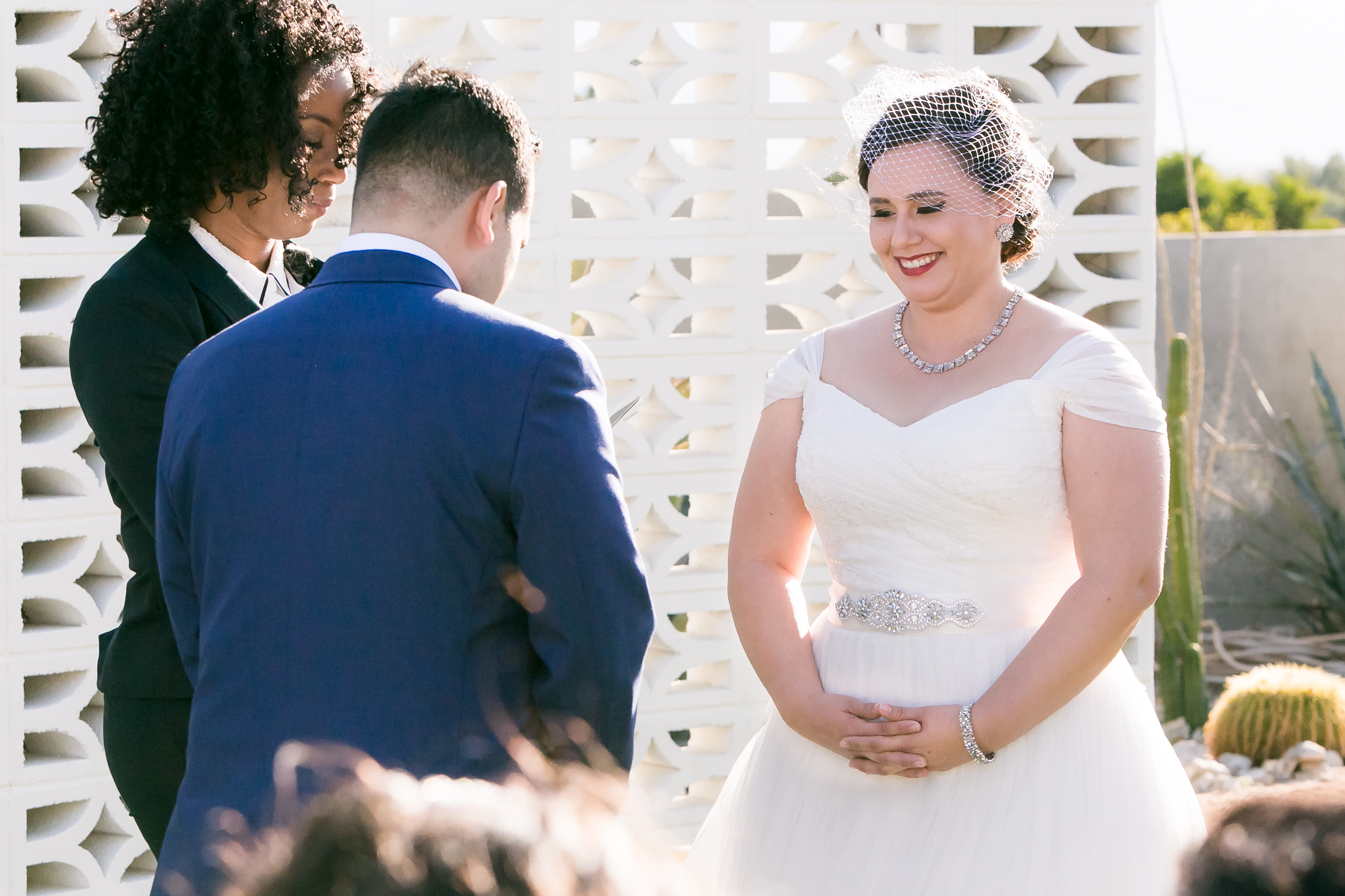 Bride giggling at groom during wedding ceremony at The Lautner, CA
