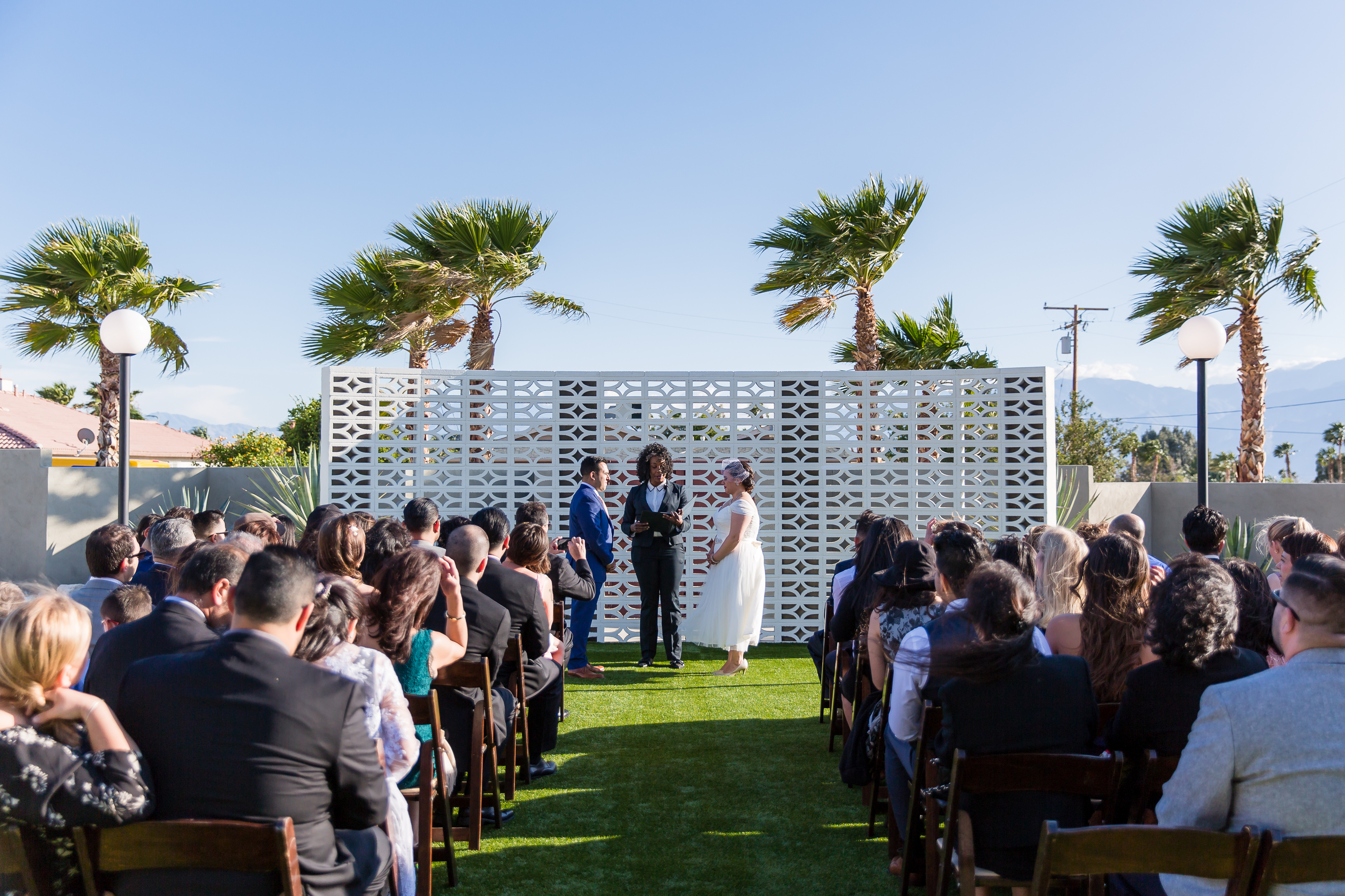 Wedding couple standing at altar during ceremony at The Lautner