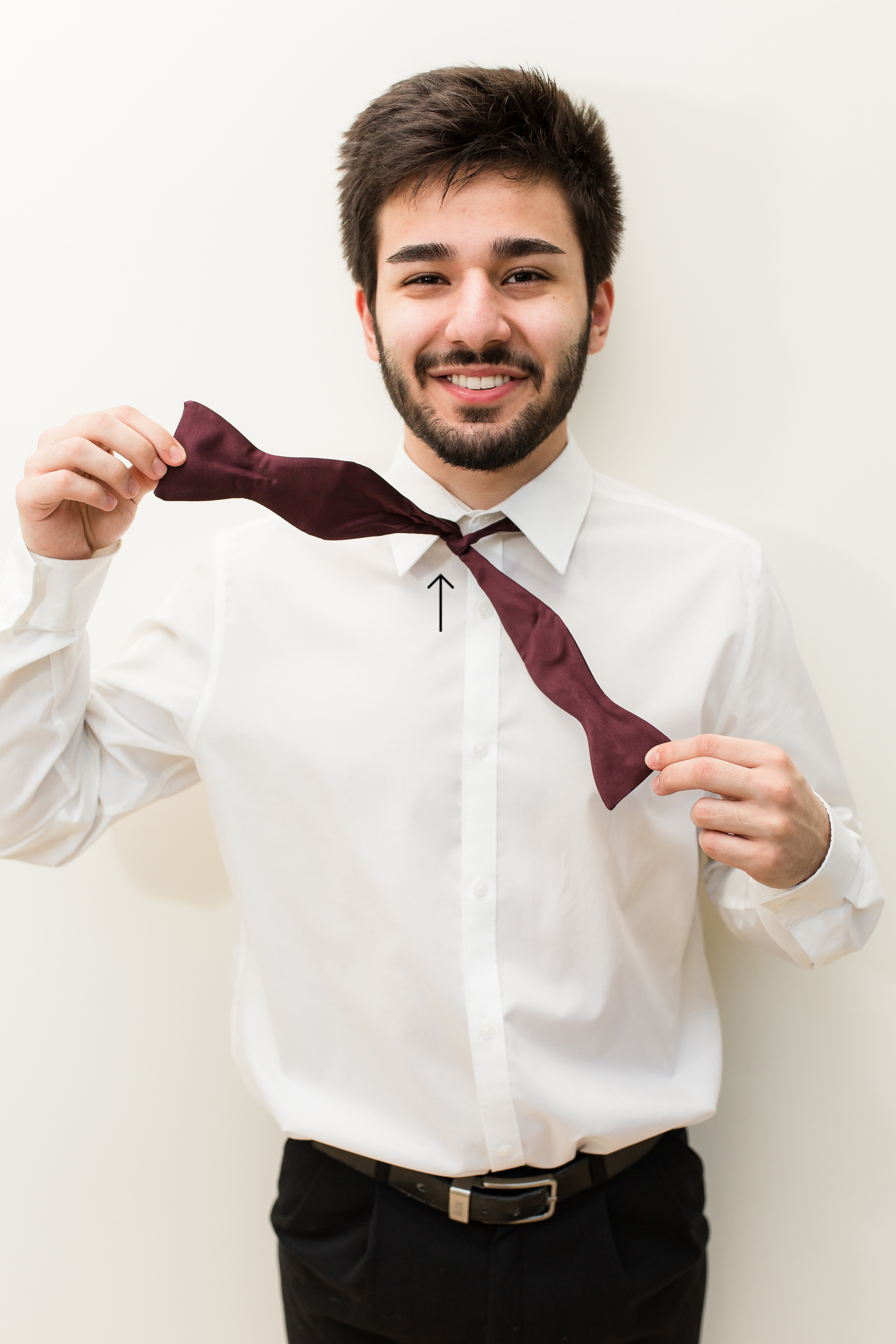 Man looping bow tie