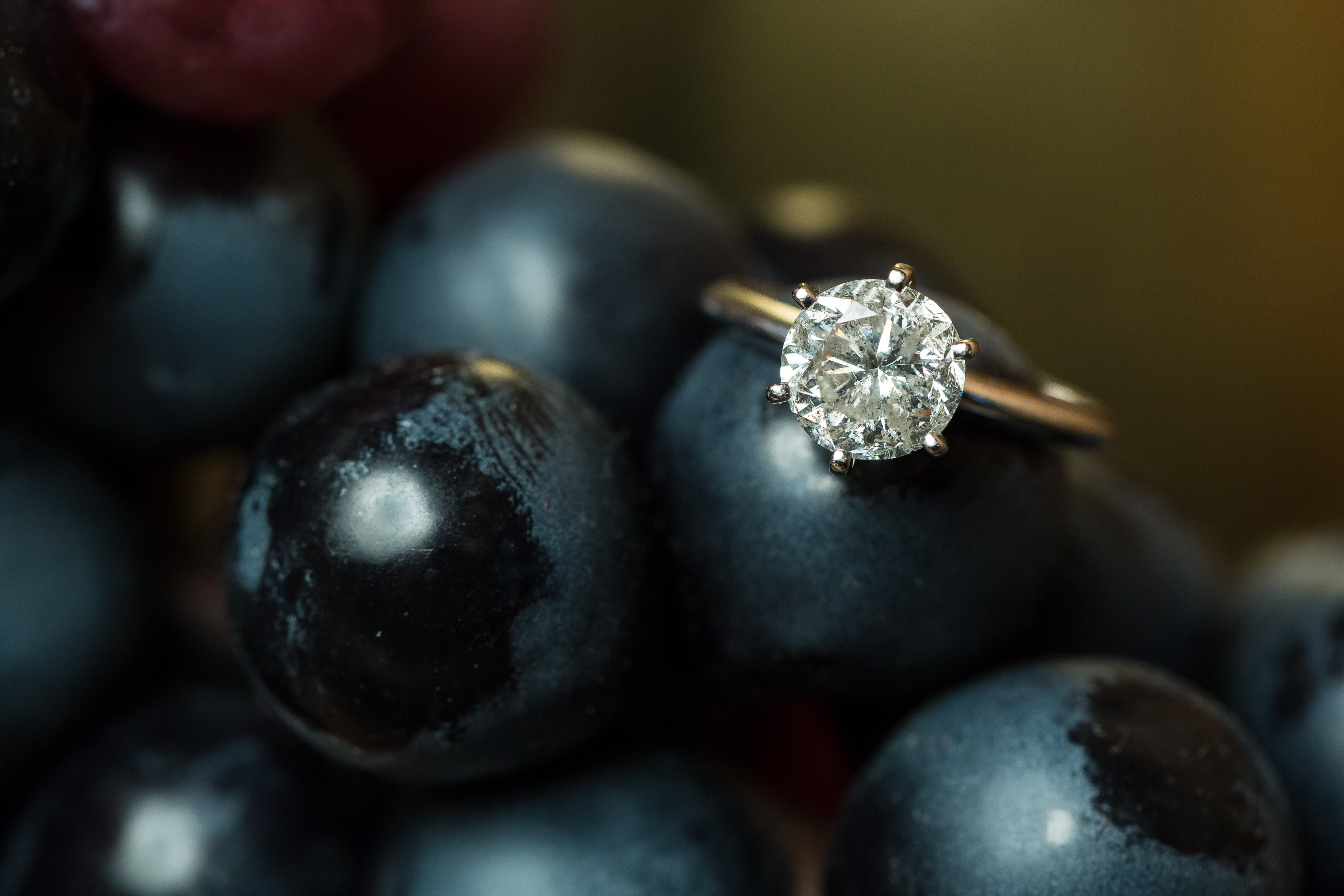 Engagement diamond ring on grapes