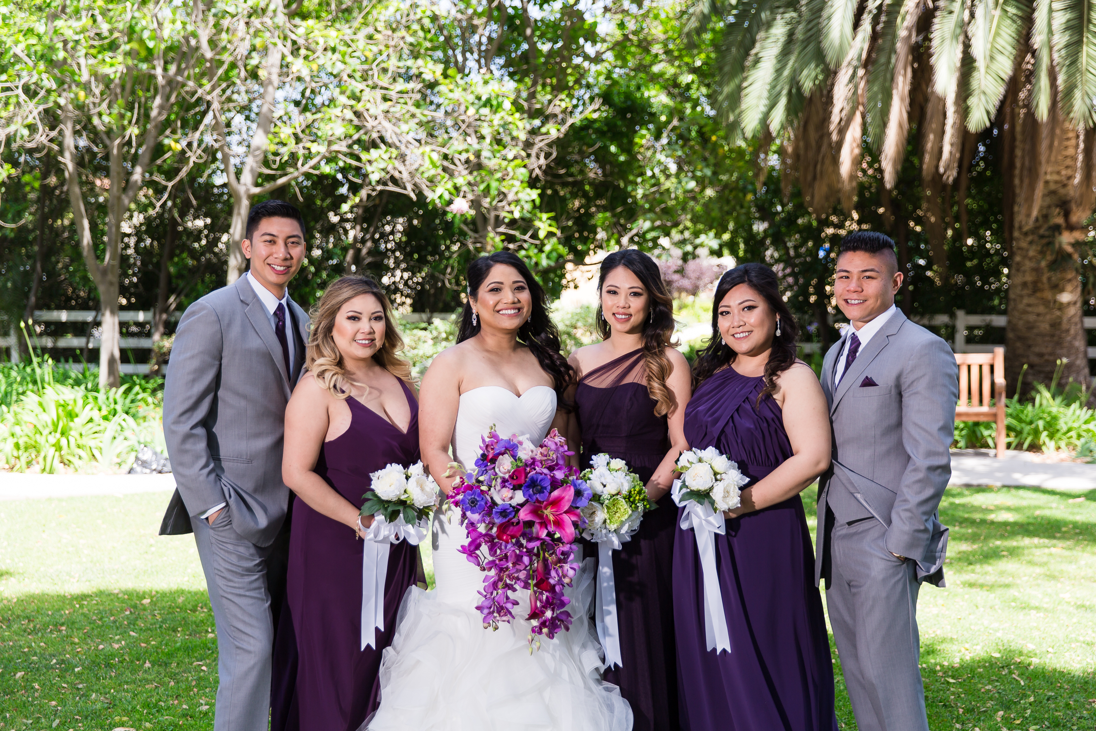 Bride and her bridal party holding wedding bouquets
