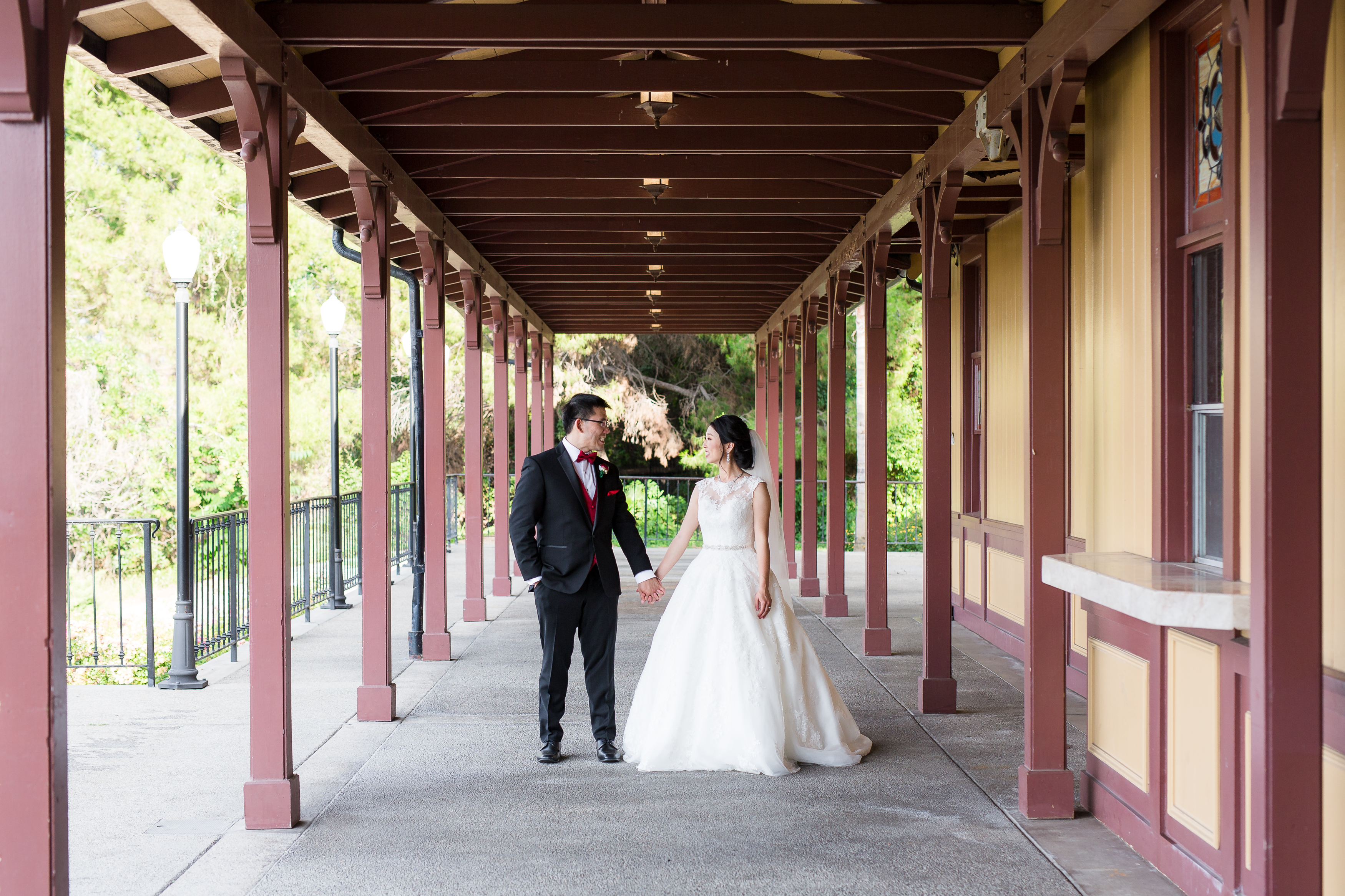 Couple walking down a covered path at Pacific Palms Resort Wedding