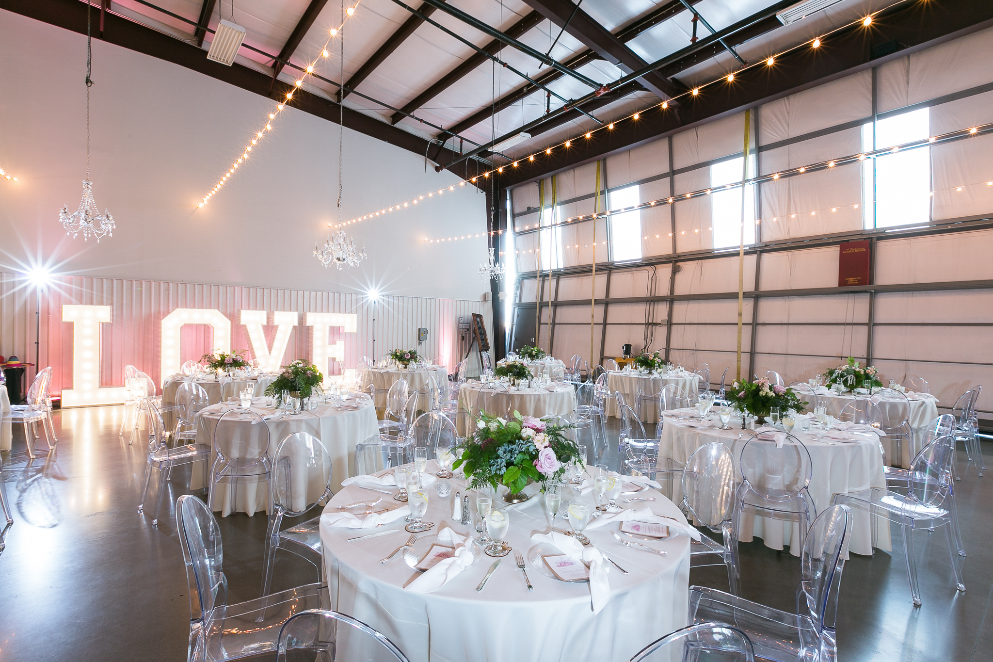 Hangar 21 wedding reception tables and decor