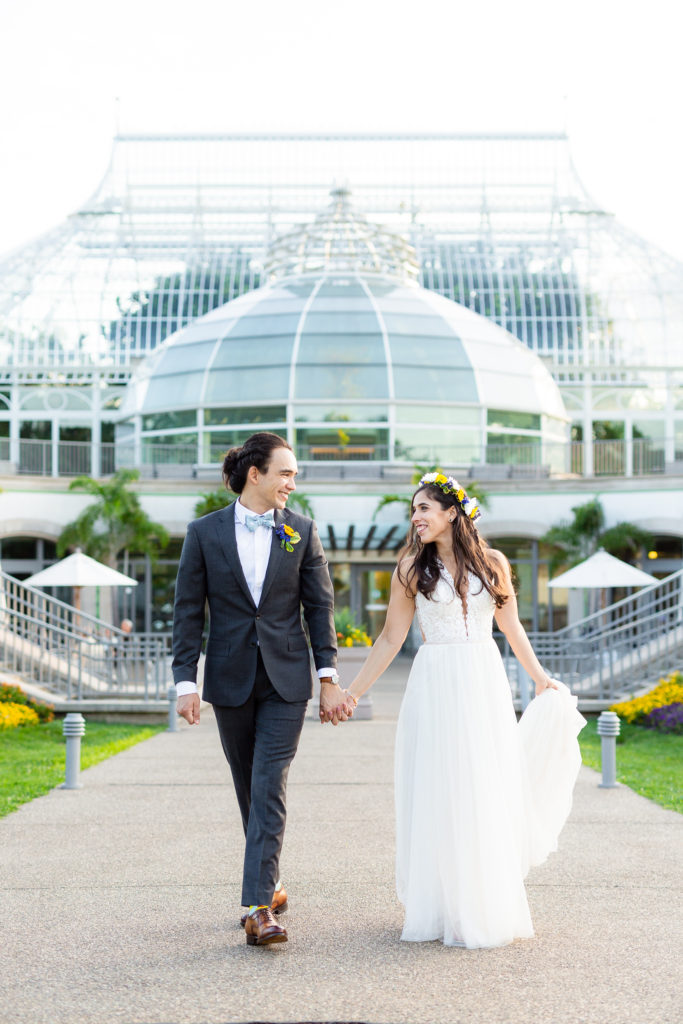 Phipps Conservatory Wedding bride and groom walking together