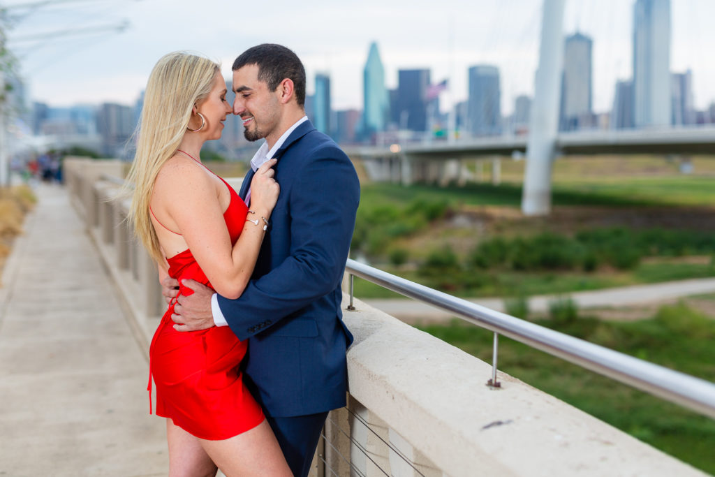 Couple during engagement photo session in Dallas