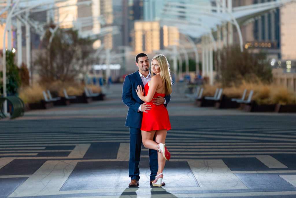 couple posing in the middle of the street