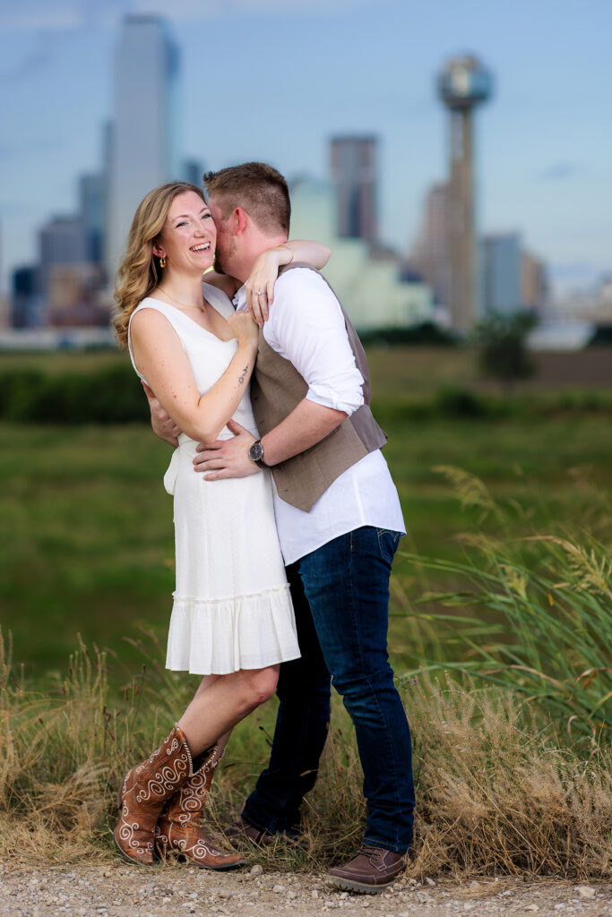 Dallas wedding photographers capture man whispering in woman's ear