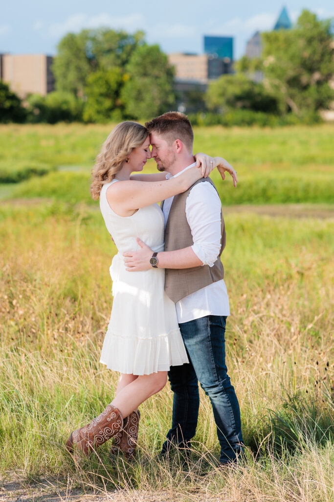 Dallas wedding photographers capture couple embracing during engagements