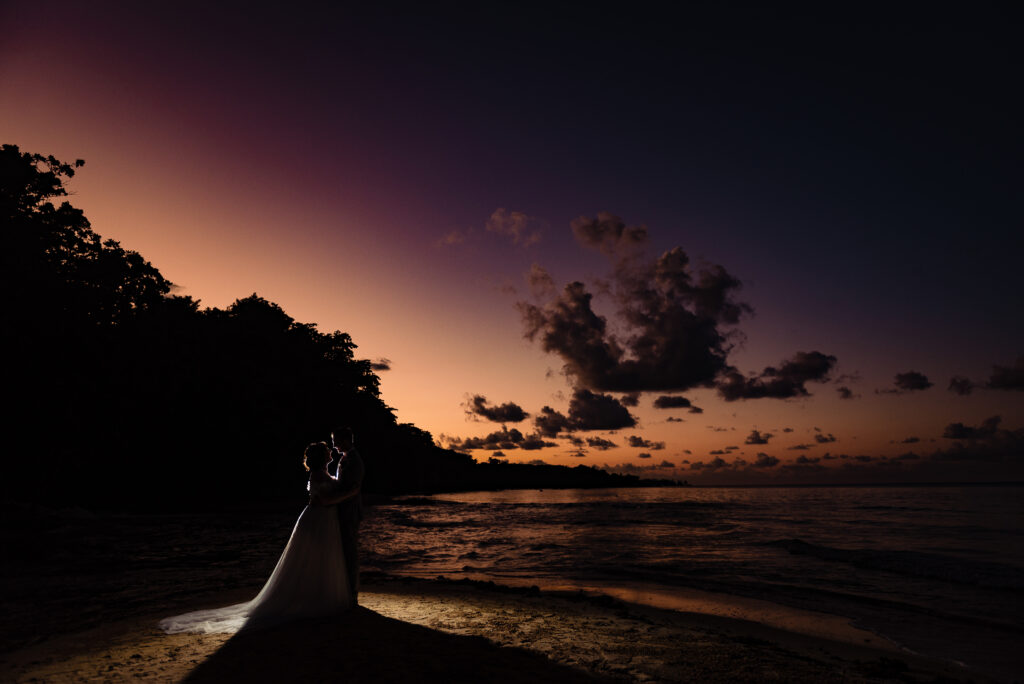 Jamaican beach destination wedding at sunset