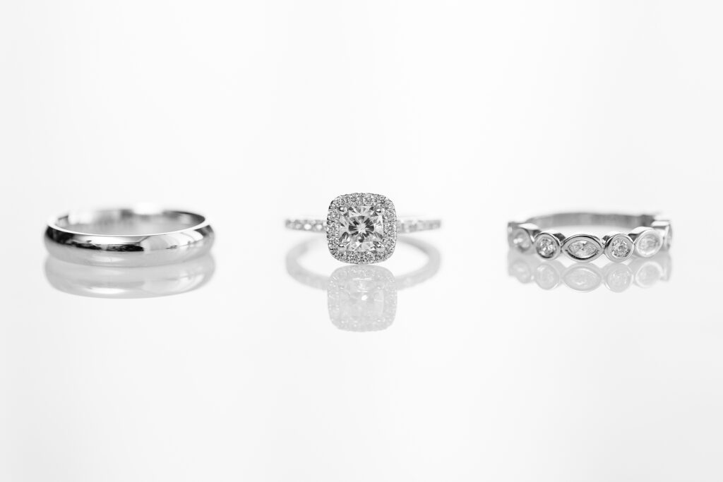 Square halo diamond engagement ring and bezel wedding ring set