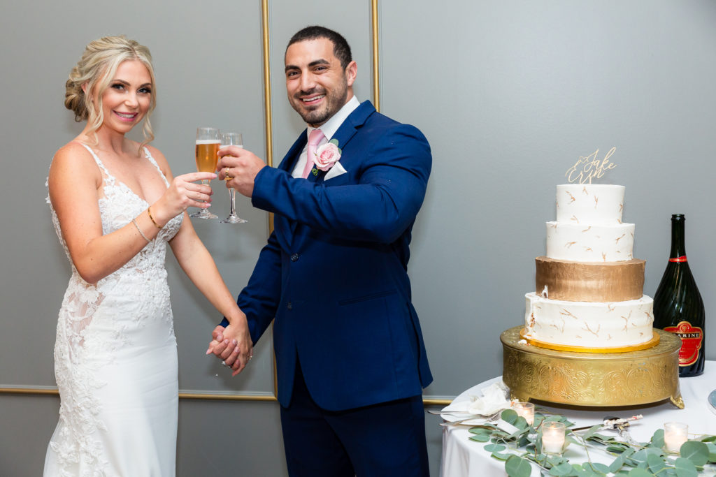 Elegant Montclair Venue Wedding couple with wedding cake