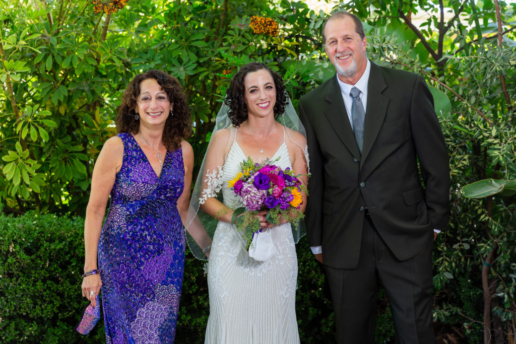 bride with parents at Intimate Backyard Wedding
