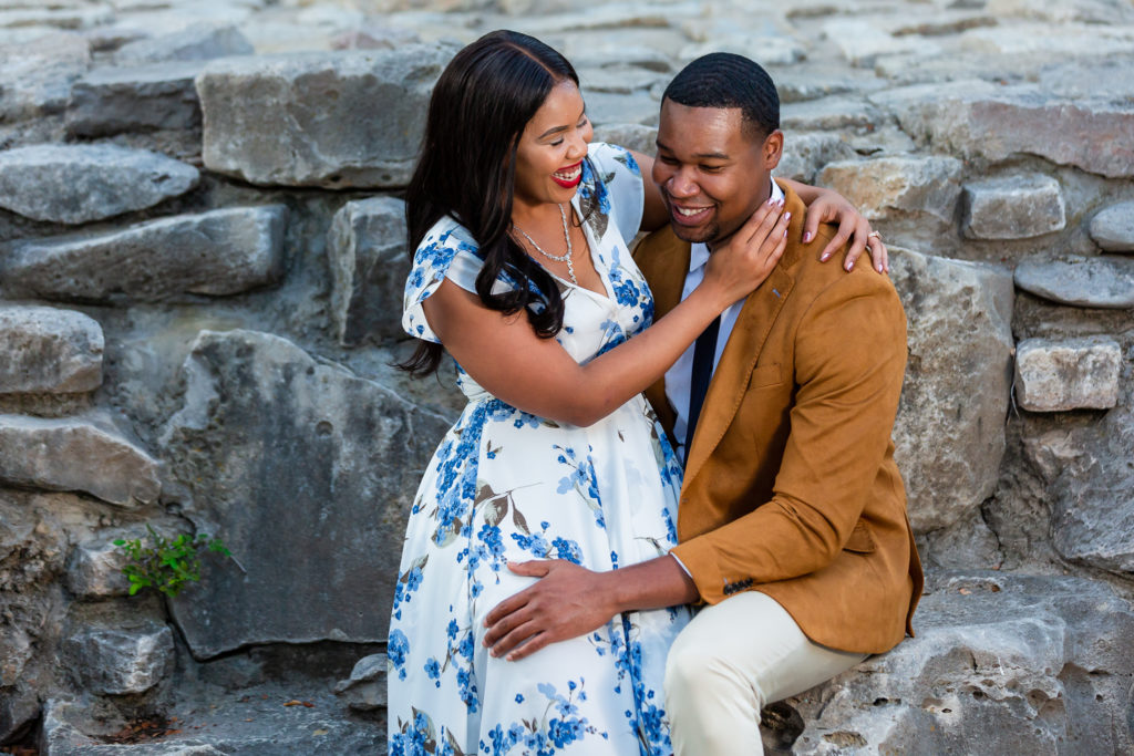 Couple laughing during engagement photo session