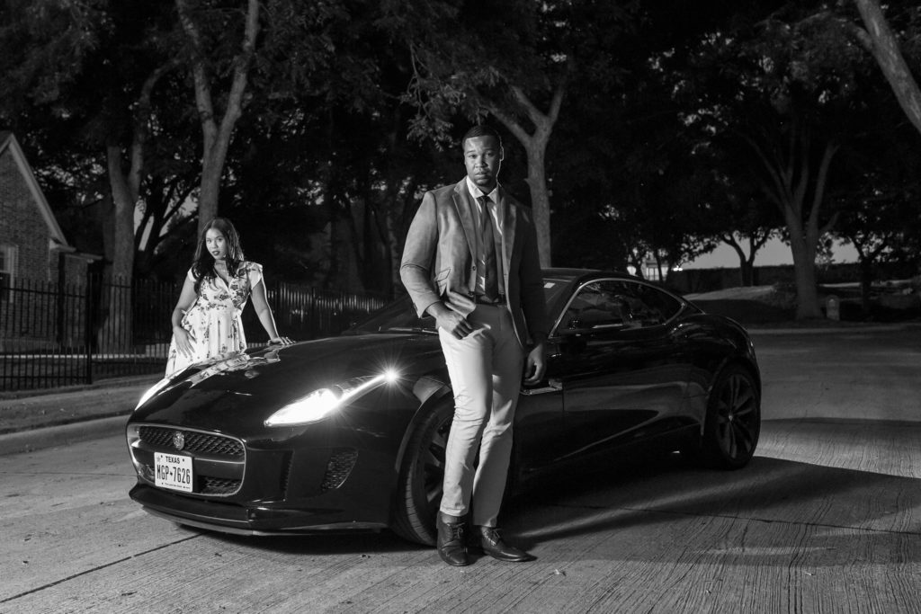 Engagement photo in back and white with sports car