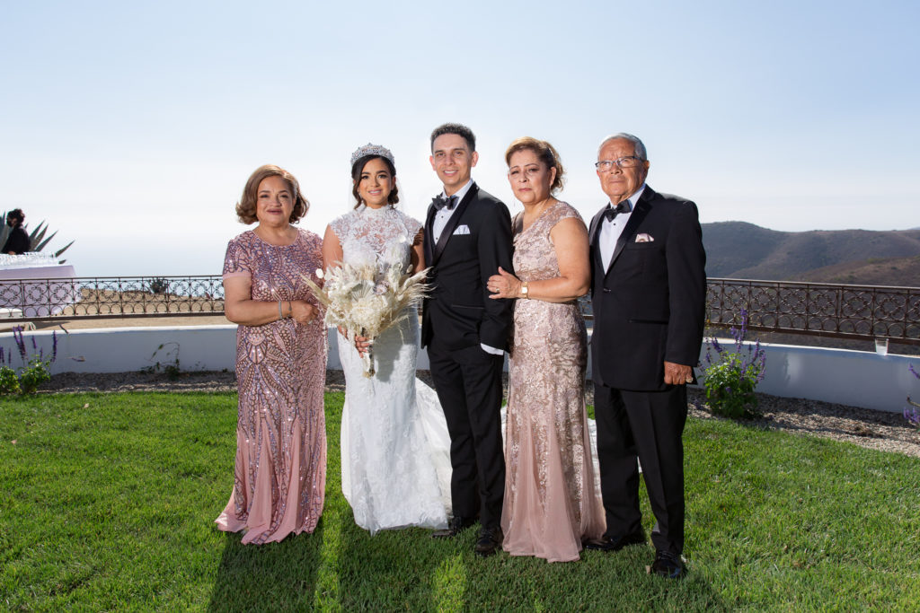 Malibu Estate wedding bride and groom with parents