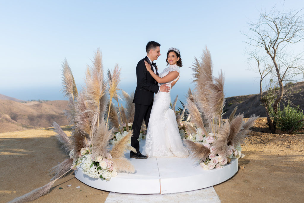 Malibu Estate Wedding birde and groom with ocean backdrop