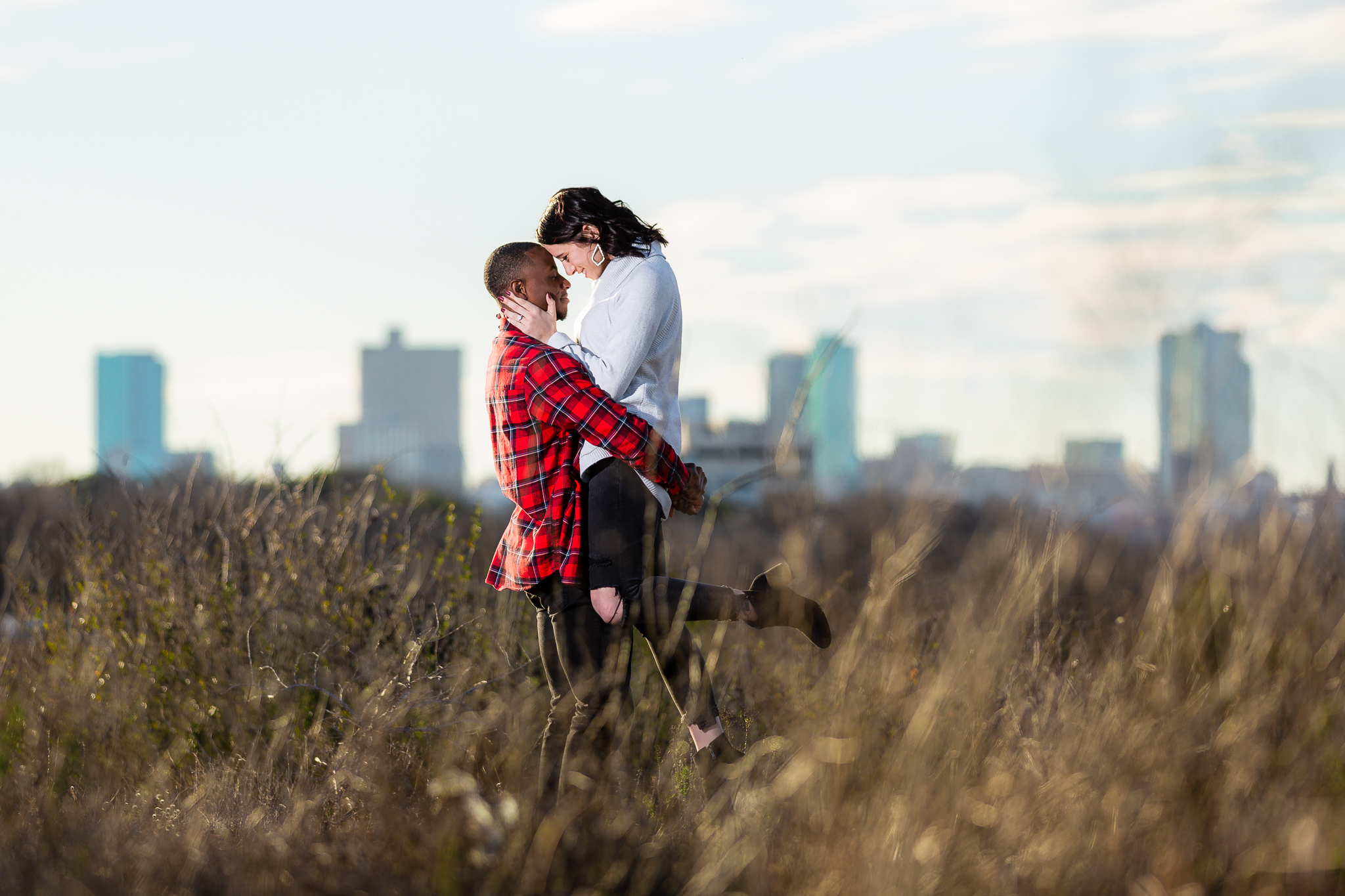 Tandy Hills Natural Area Engagement Photoshoot with Fort Worth skyline in background