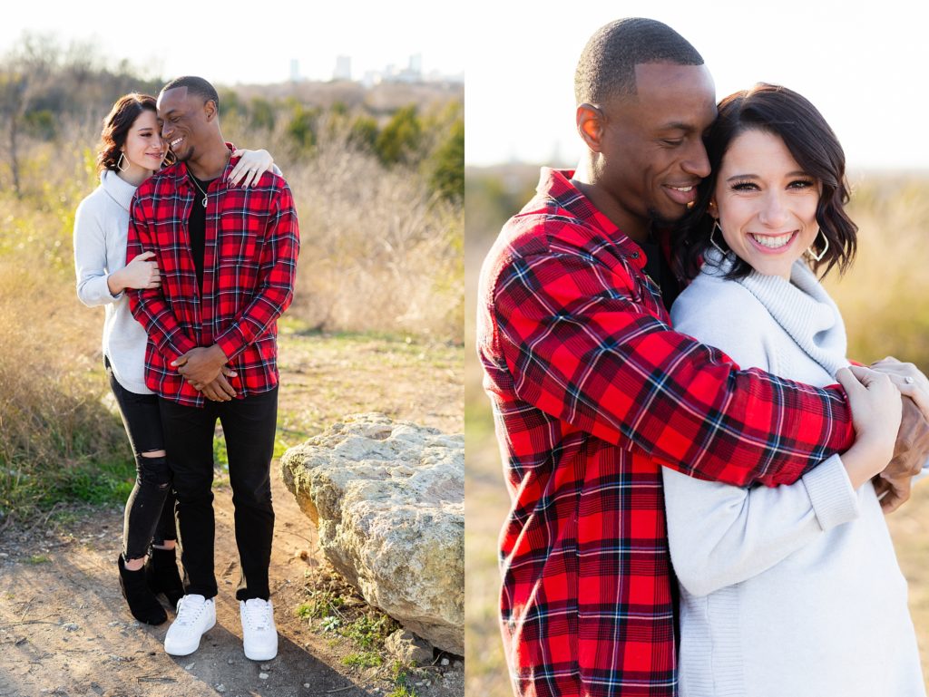 Couple hugging during photoshoot in park