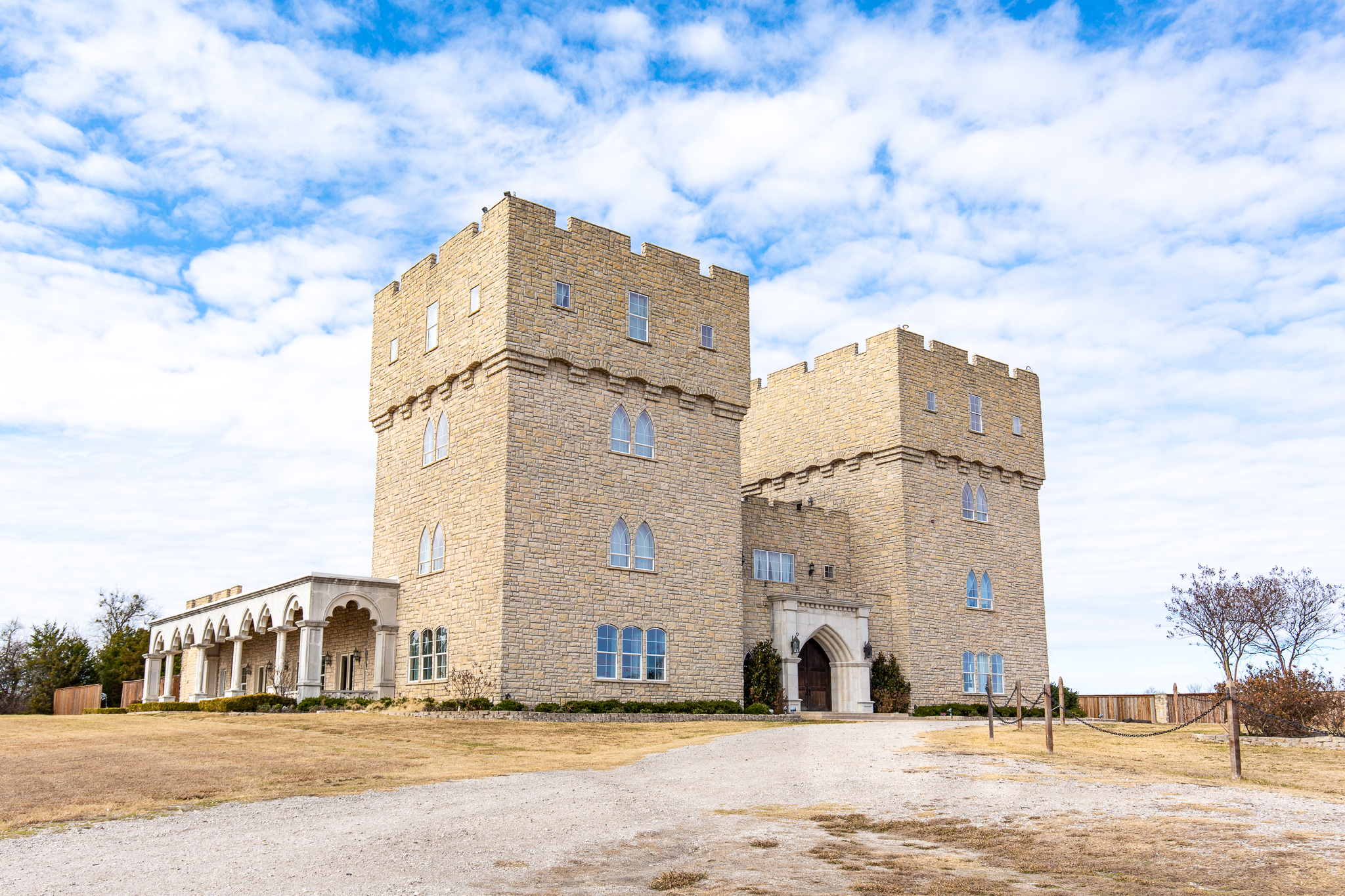 The Castle at Rockwall wedding venue on a cloudy day in Dallas