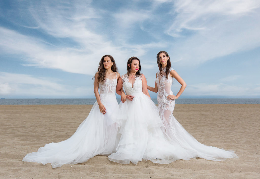 Group of brides on the beach