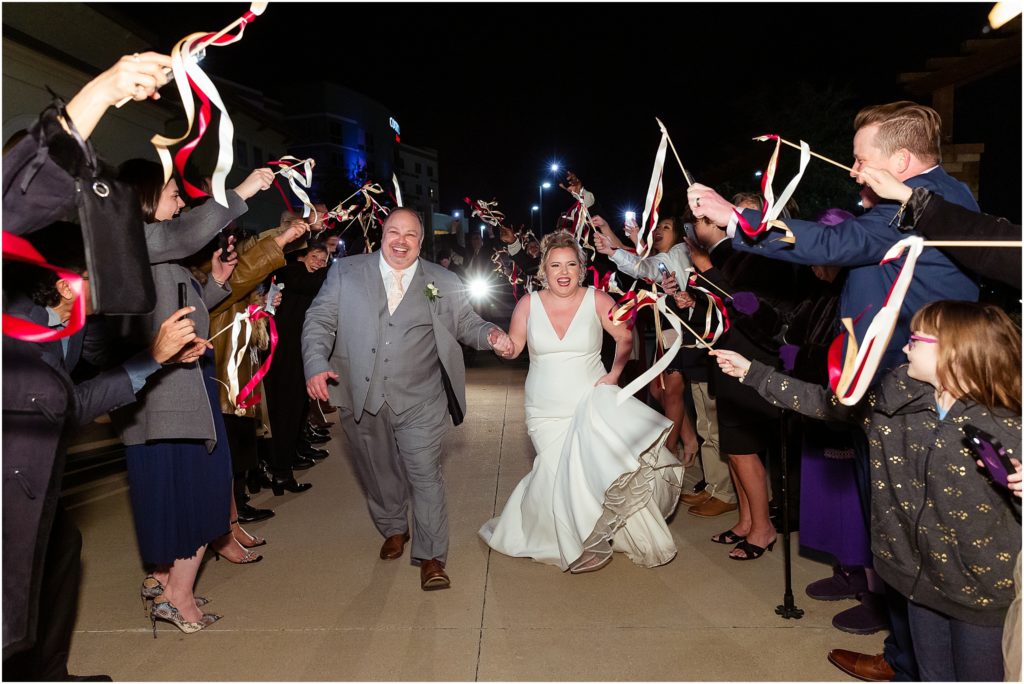 wedding streamer exit after dallas wedding captured by Dallas wedding photographers