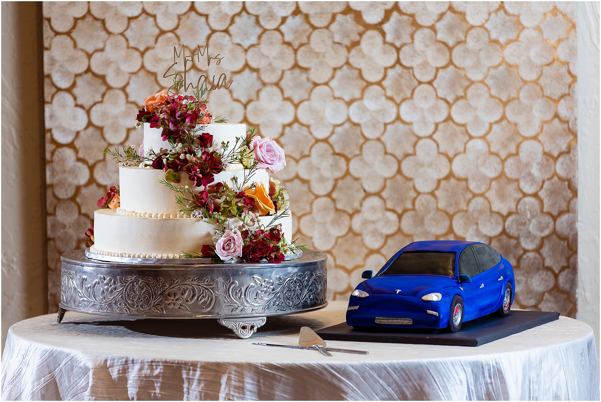 blue tesla grooms cake and white wedding cake with florals at chapel ana villa dallas wedding