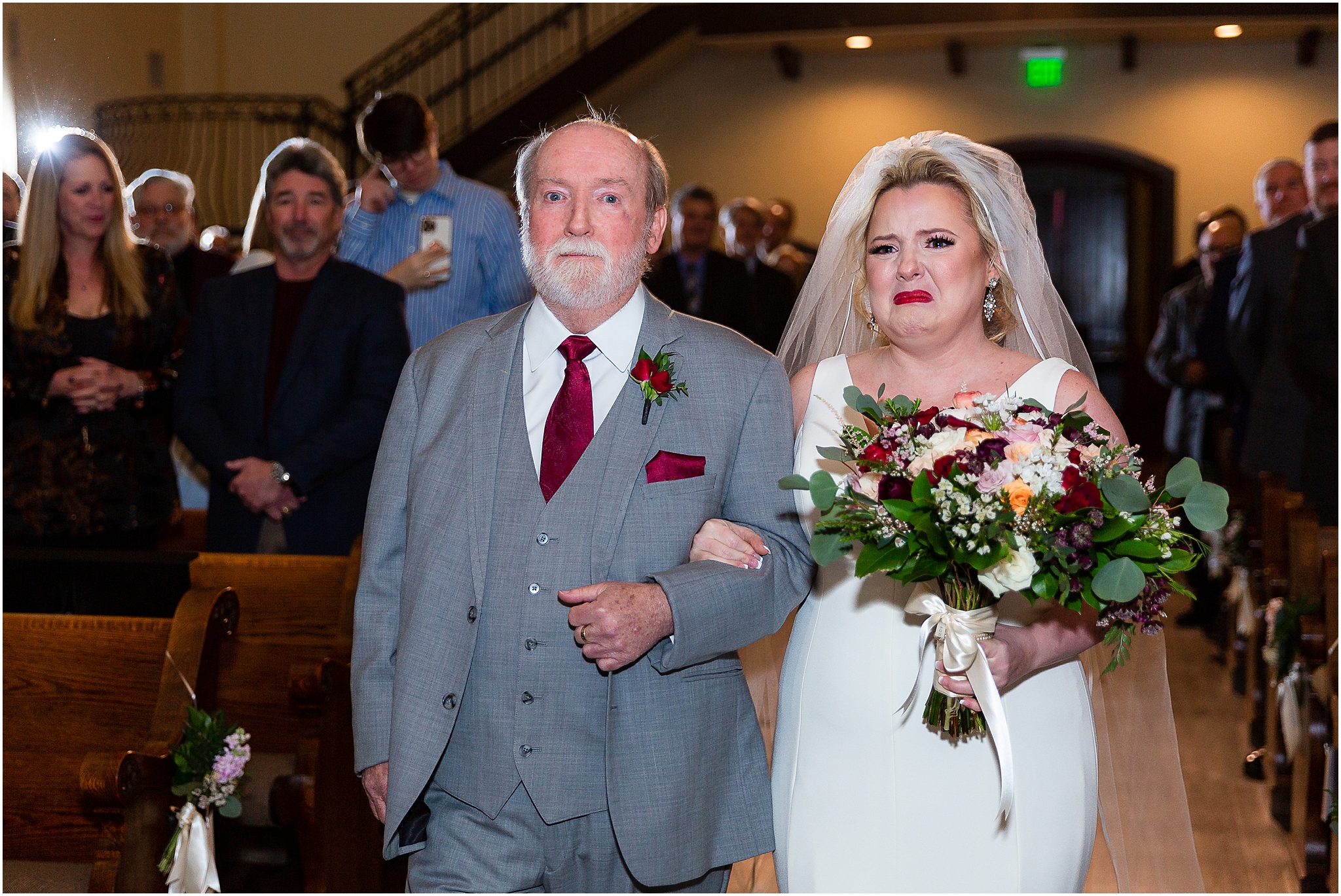 bride crying as she walks down the aisle at chapel ana villa texas