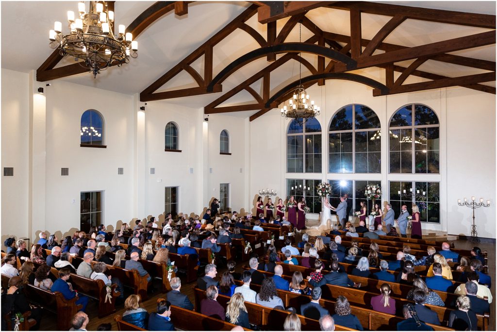 full chapel at ana villa wedding ceremony in dallas texas captured by Dallas wedding photographers