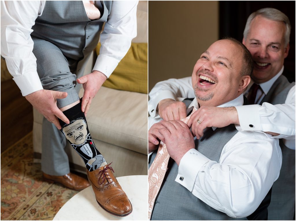 Dallas wedding photographers capture getting ready photos of the groom, including his graphic socks and adjusting his tie in luxury Dallas wedding venue