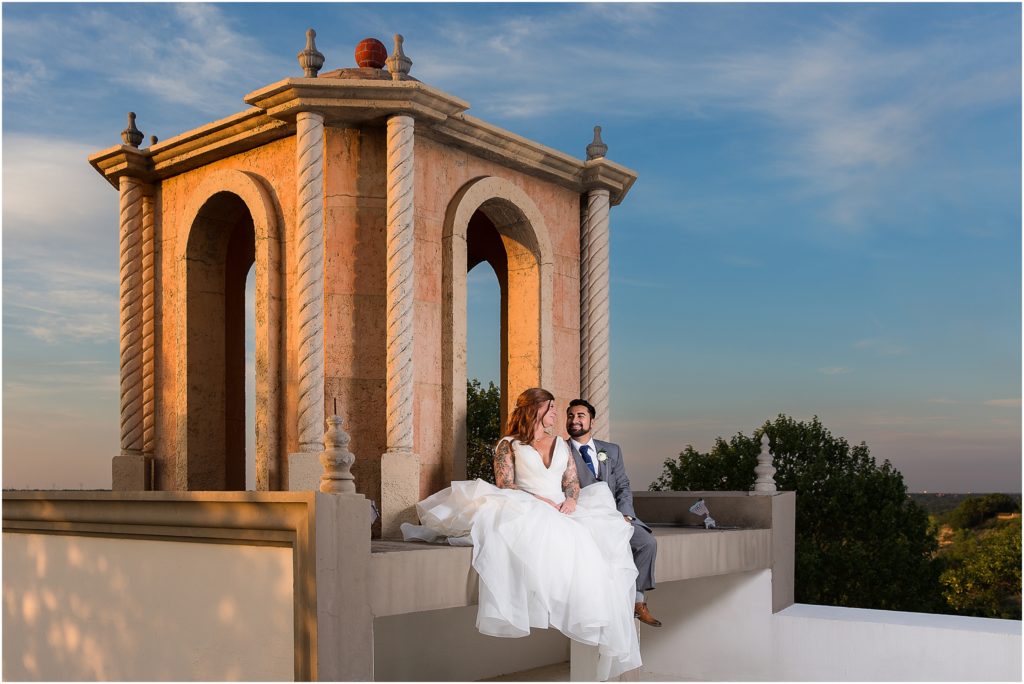 stoney ridge villa wedding venue in azle tx wedding couple on rooftop at sunset by dallas wedding photographer Stefani Ciotti Photography