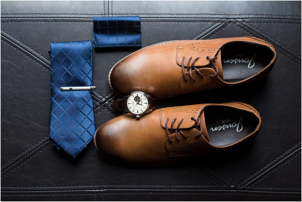 Dallas wedding photographer photographs groom shoes watch anti-sitting on a leather seat for a detail shot