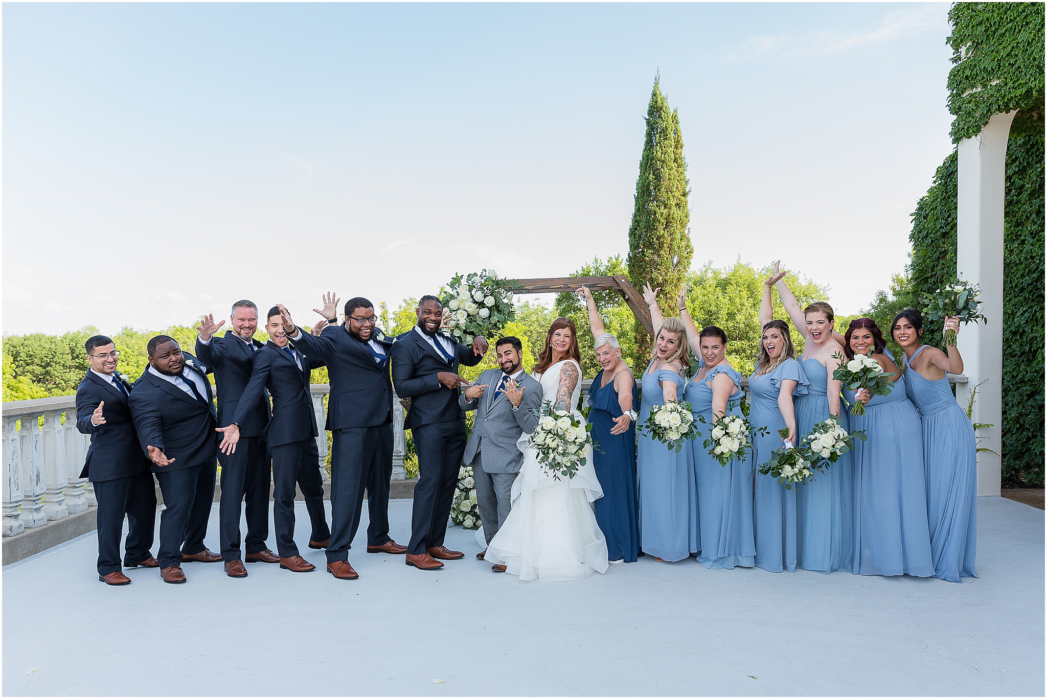 fun dusty blue wedding party in dallas texas