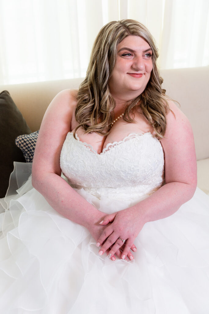 Dallas wedding photographers capture bride wearing wedding gown during portraits