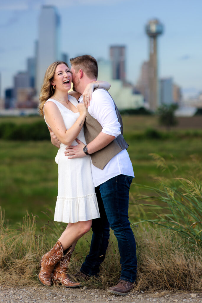Dallas wedding photographers capture man whispering in woman's ear