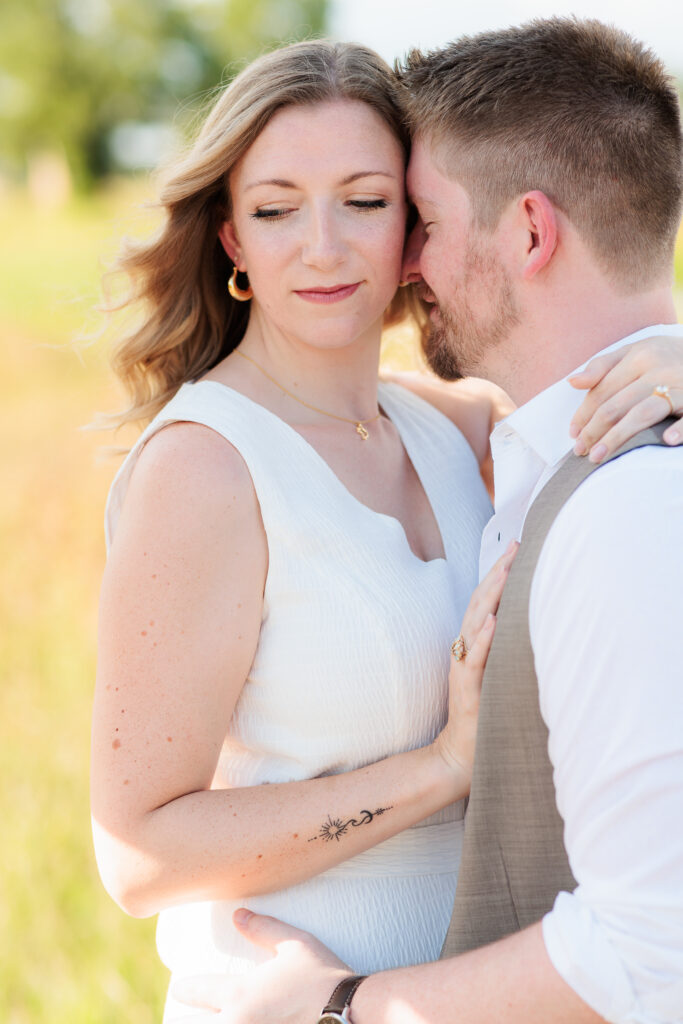 Dallas wedding photographers capture man nuzzling woman's neck 