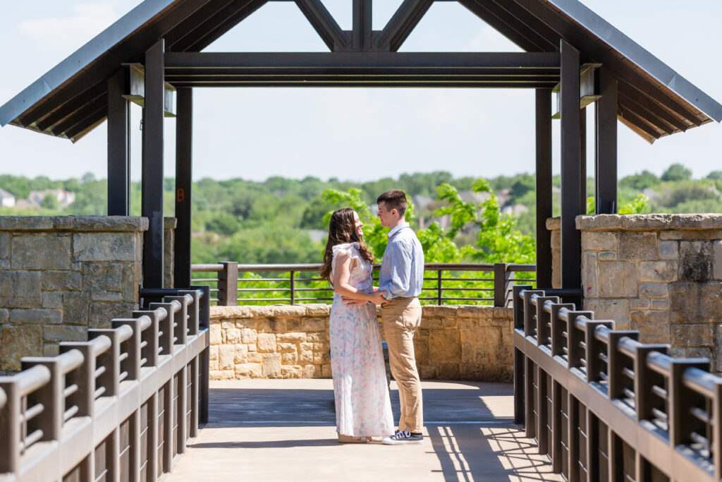 Dallas wedding photographers capture couple at gazebo after recent proposal