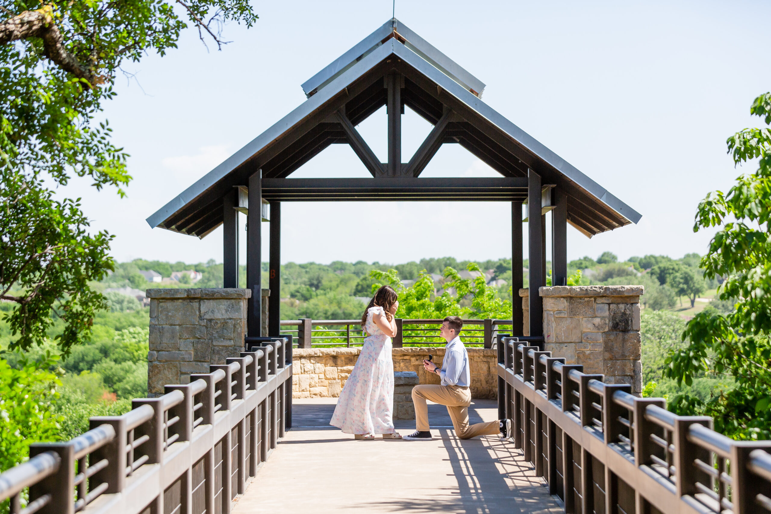 Dallas wedding photographers capture man down on one knee during Arbor Hills Nature Preserve proposal