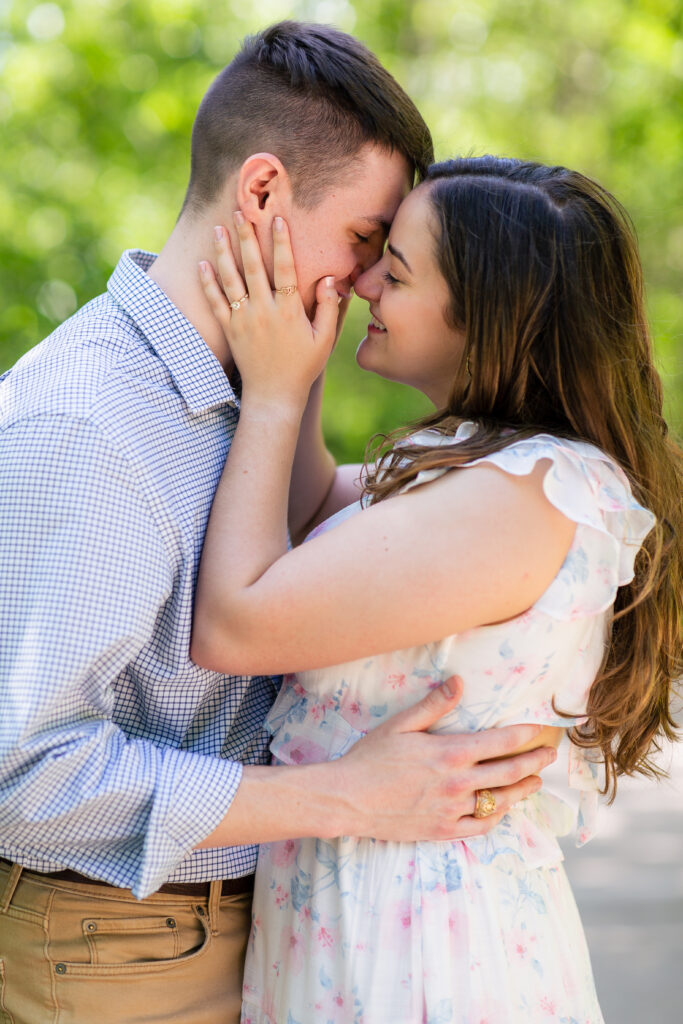 Dallas wedding photographers capture couple kissing after proposal