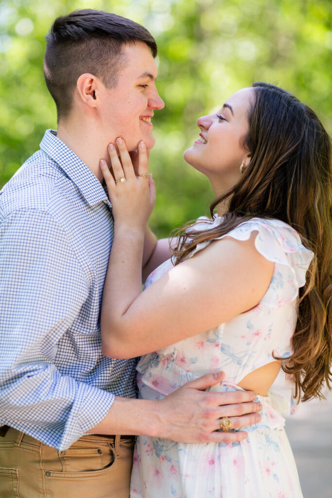 Dallas wedding photographers capture couple laughing together after recent engagement
