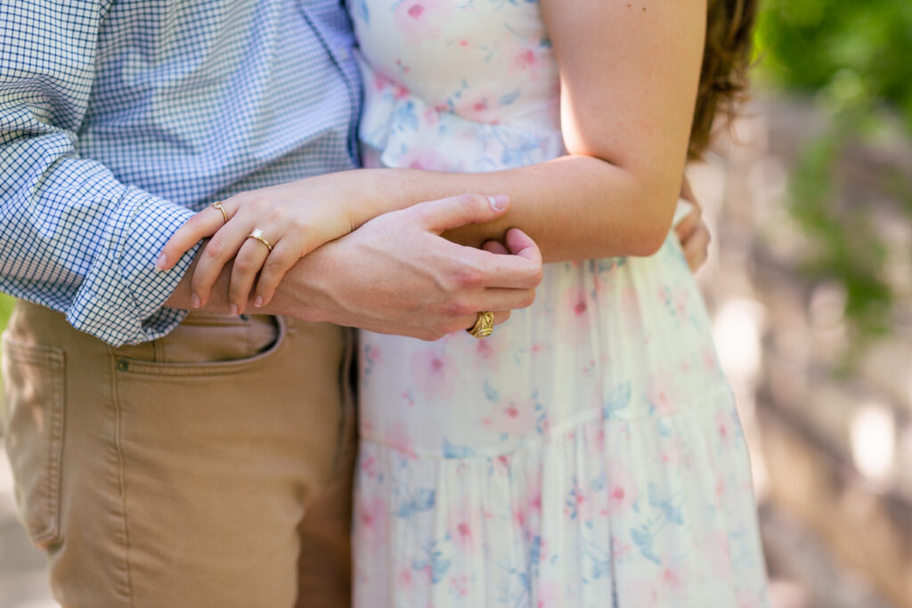 Dallas wedding photographers capture close up of couple's hands at Arbor Hills Nature Preserve
