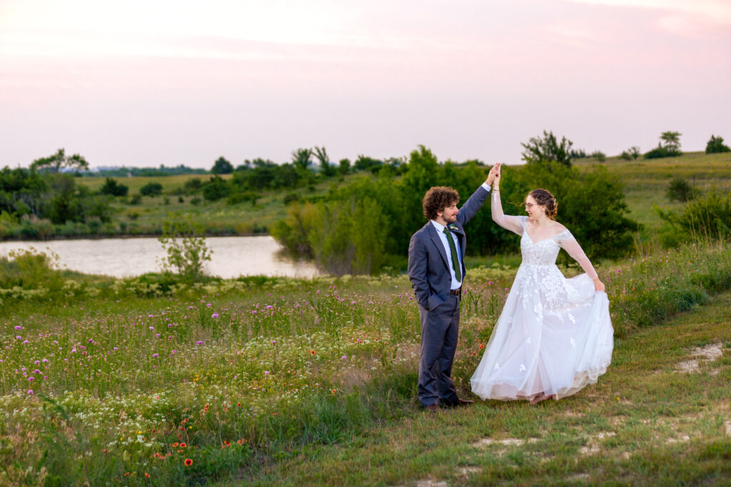 Dallas wedding photographers capture groom spinning bride 