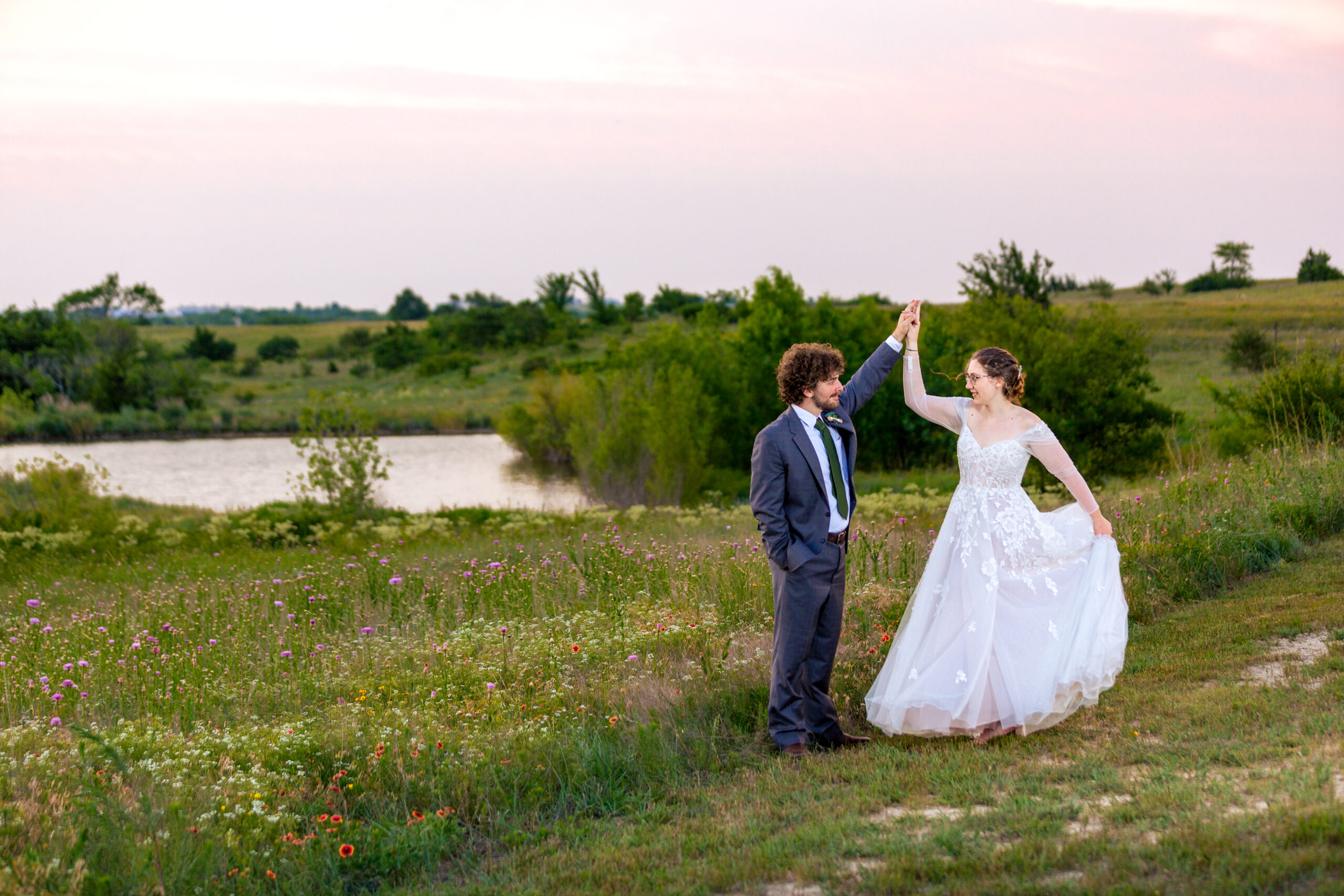 Dallas wedding photographers capture groom spinning bride