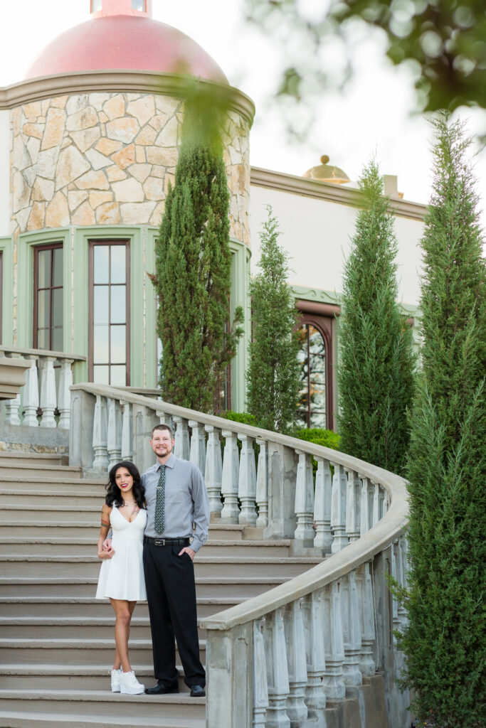 Dallas wedding photographers capture couple standing together on staircase