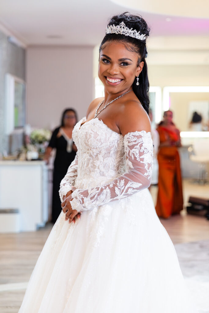 Dallas wedding photographers capture bride wearing tiara and smiling