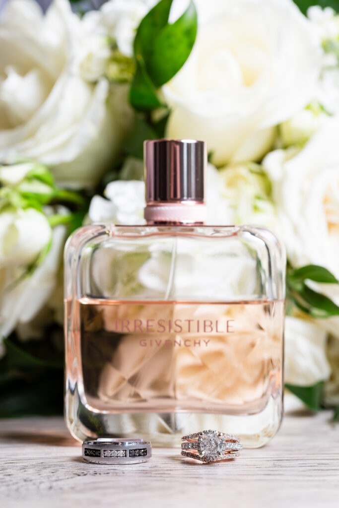 Dallas wedding photographers capture close up of perfume and bridal details at Knotting Hill wedding