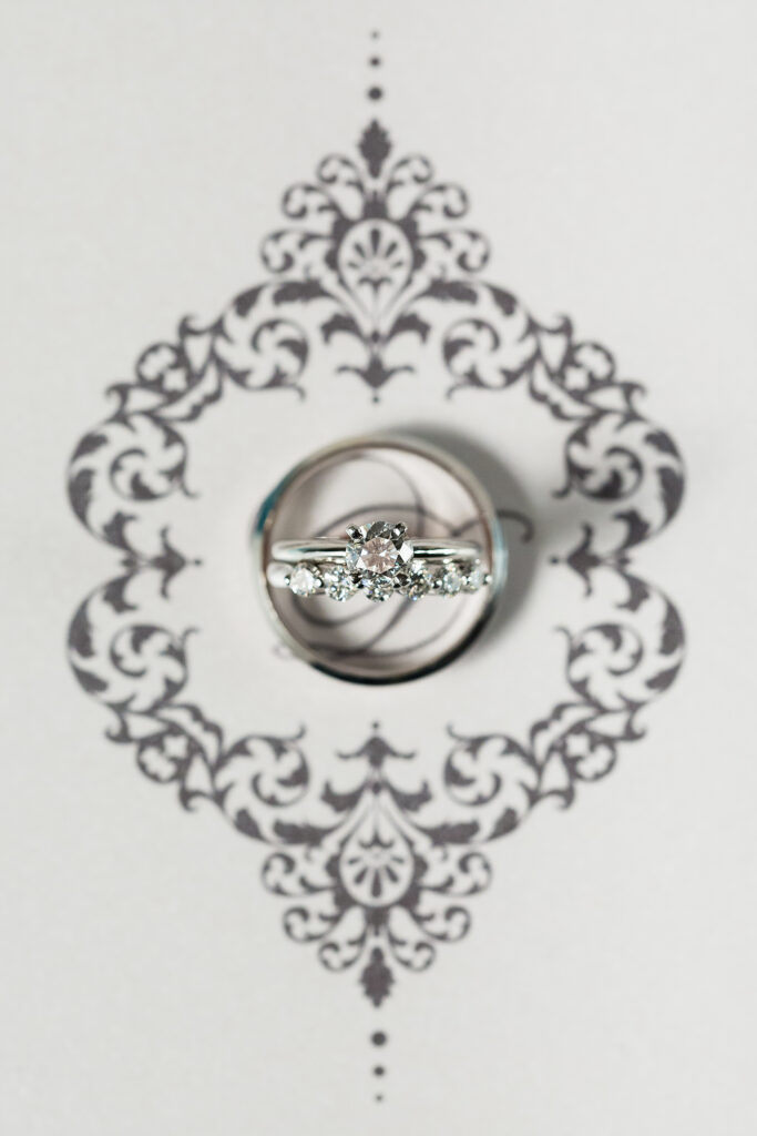 Round solitaire diamond ring with diamond wedding band