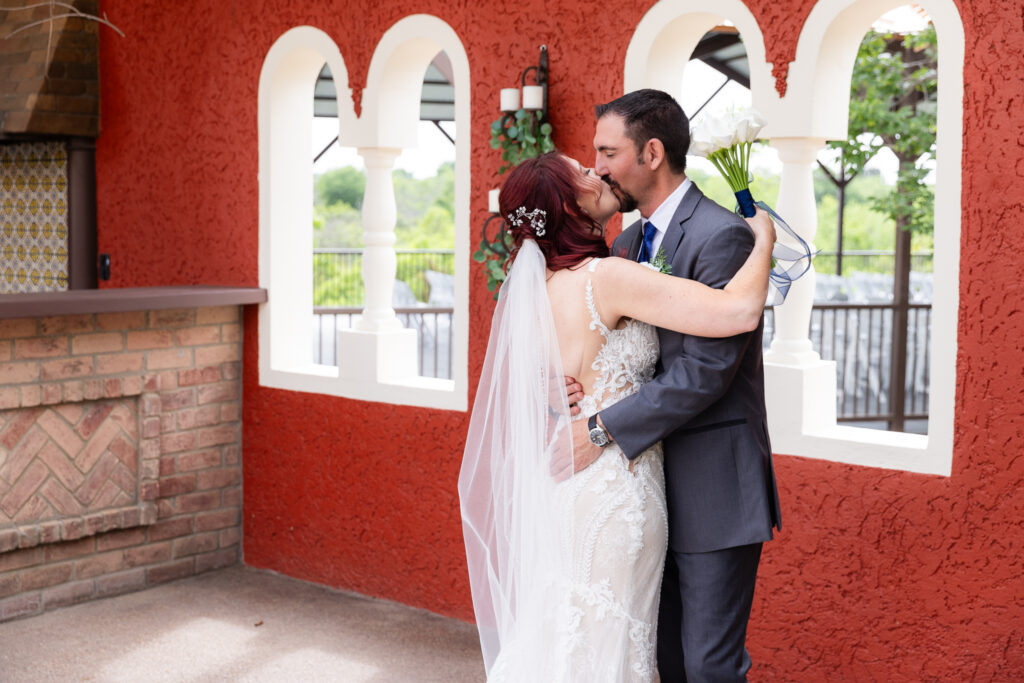 Bride and groom kissing